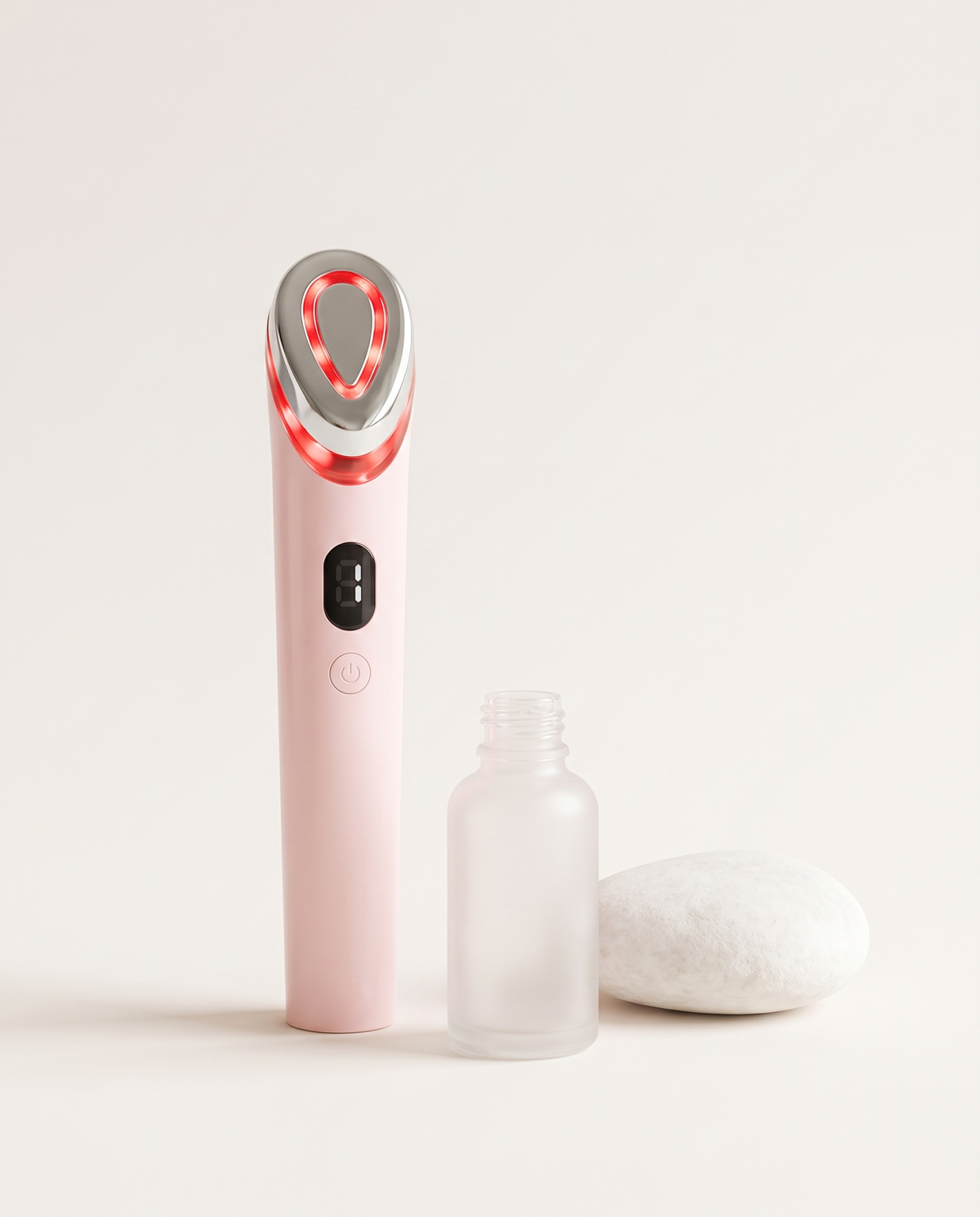 WELLURIA microcurrent face sculpting device in blush pink